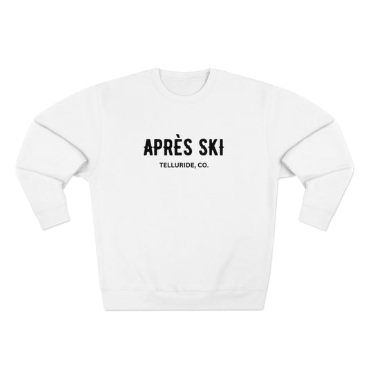 White premium crewneck sweatshirt with black writing spelling out "Apres Ski" and "Telluride, CO.". The sweatshirt is made of soft, comfortable cotton and features a relaxed fit. It is perfect for a day on the slopes at Telluride Ski Resort or for a night out on the town. 