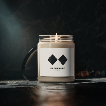 Soy candle with a white label and black lettering saying "I'm Difficult" and two double diamond ski signs. The candle is made of natural soy wax and is perfect for adding a touch of ambiance to any room. The two double diamond ski signs are a reference to the most challenging ski runs at Telluride Ski Resort, making this candle a great way to show your support for the resort and the ski and snowboard lifestyle.