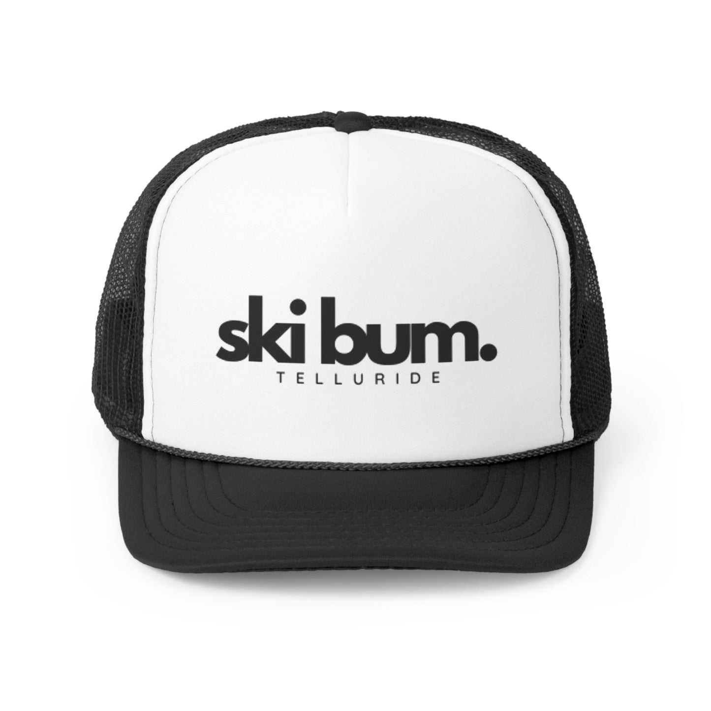 Black trucker hat with white label featuring black lettering saying "Ski Bum" and Telluride. The hat is perfect to keep the sun out of your face while you're skiing or snowboarding. The phrase "Ski Bum" is a popular term for someone who loves to ski or snowboard and who lives or spends a lot of time in a ski resort town. This hat is a great way to show your love of skiing and snowboarding, and your love of the Telluride Ski Resort. 