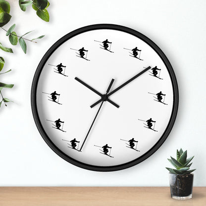 White clock face with black wooden border and skiers in place of the hours, denoting that it's always "Ski Time." The clock is perfect for keeping track of time, whether you're on the slopes or not. The skiers on the clock represent the joy of skiing and snowboarding, and the phrase "Ski Time" is a reminder that there's always time for a good time on the mountain whether you’re at the Telluride Ski Resort or not.