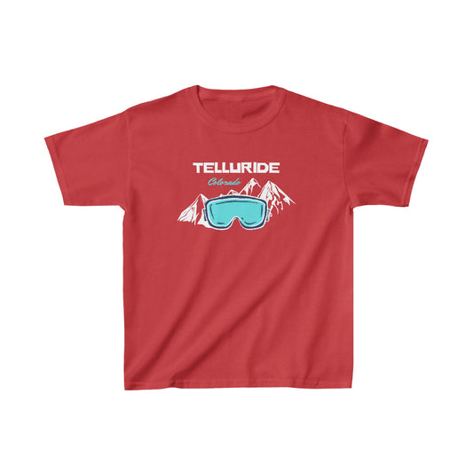 Red kids' t-shirt with white lettering saying "Telluride Colorado". The t-shirt also has a blue image of ski or snowboard goggles and a mountain in the background. The t-shirt is a stylish and comfortable way for kids to show their love of skiing and the Telluride Ski Resort. The t-shirt is a great way for kids to show their love of Telluride and Colorado, whether they're skiing, snowboarding, or just hanging out with friends.